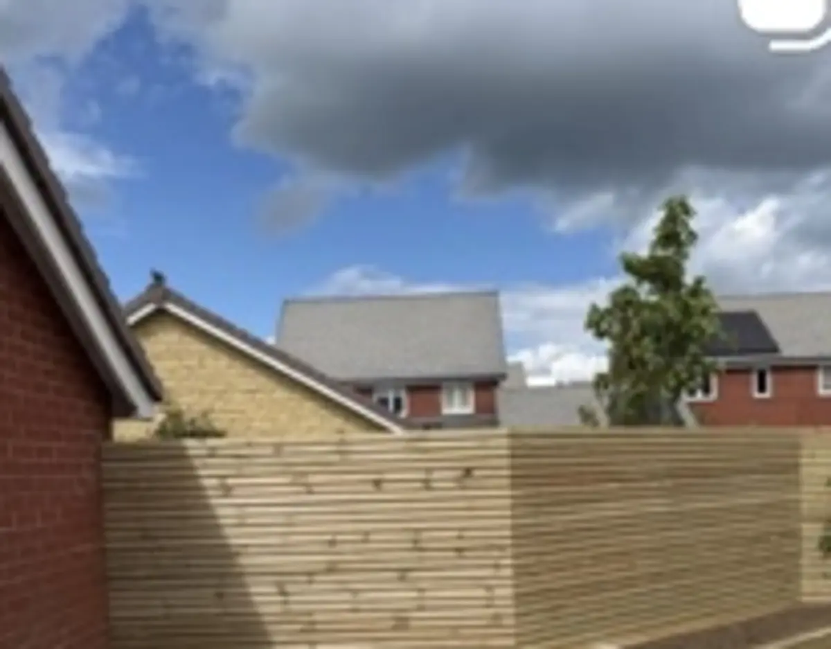Contemporary horizontal slatted timber garden fencing